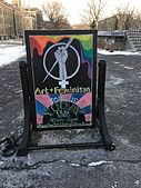 Signboard welcoming editors to the Cornell University 2017 Art + Feminism Wikipedia edit-a-thon, Olin Library, March 11, 2017. Artwork by Carla DeMello.