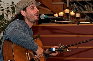 Schmidt playing a house concert in Boalsburg, PA in 2008.