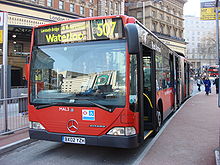 Low floor articulated London bus with its doors open