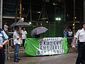参与示威的香港家务助理总工会的横额