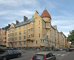 Olofsborg (apartment building) [fi] (Swedish for Olavinlinna, which the top resembles) at Katajanokankatu 1 / Kauppiaankatu 7, 1902