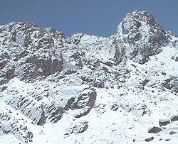 The mountain Wamp'una; entrance to Qaqa Mach'ay at left centre