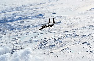 An USAF F-15C Eagle fighter flying over Iceland during an Icelandic Air Policing patrol in April 2015