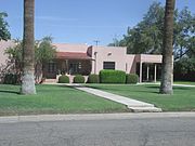 The Walter Wilbur House was built in 1939 and is located at 904 E. 8th St. It was listed in the National Register of Historic Places in 2002, reference #02000752.