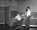 An IBM 650 computer, introduced in 1953, came with the IBM 533 Card Reader/Punch, right. At many IBM 650 installations, punched cards and address 8000 on the console were the only input and output medium.