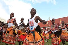 Children of New Bright School presenting Kiganda Traditional dance in the school compound.