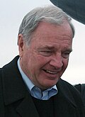 Paul Martin shakes hands with Chief of Staff Col. Joe Torres 2005 (cropped).jpg