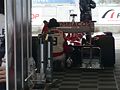 Olympiacos CFP car in the pitlane garage at Silverstone Circuit (2010)