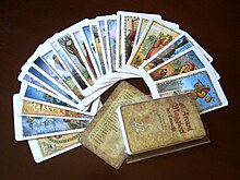 A fan with 22 cards, an index and their box.
