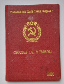 Thin and small Membership card/ document of the Romanian Communist Party (PCR). Made in 1980. The party's emblem and the words "Proletari din toate țările, uniți-vă!; Carnet de membru; 1980" are on the booklet's cover.