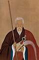 A portrait of Zen monk Ingen holding a wooden staff and a fly-whisk