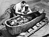 Howard Carter opens the innermost shrine of King Tutankhamun's tomb near Luxor, Egypt, 1922.