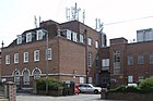 A cell site placed atop an existing building