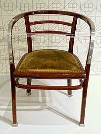 Armchair designed by Otto Wagner and made by Gebruder Thonet (1905-1906), of beechwood, aluminum, and cane under the upholstery (Montreal Museum of Fine Arts)