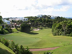 A golf course in Tucker's Town, surrounded by houses