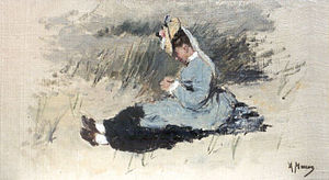 An elegant young lady wearing a fancy bonnet is sitting in the dunes dressed in her Sunday best, a black dress with a pale blue smock.