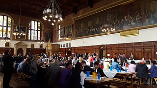 Pupils in the dining hall, with the Verrio painting in the background