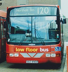 Low floor red London bus in 1998, with "low floor bus" graphic at the front