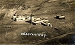 A historical photo depicting the observatory from above, with the word OBSERVATORY written on it