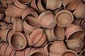 Indian red clay teacups, unglazed, are used by some vendors.