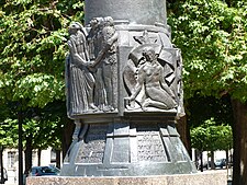 Two of the bas-reliefs on the Mickievicz monument."The Three Polands" and "Aldona"