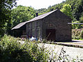 The canal-side Wharf Shed at High Peak Junction, a little distance from the workshops. The awning overhangs the canal.