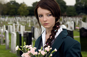 Dakota Blue Richards as April Johnson in the 2008 film Dustbin Baby