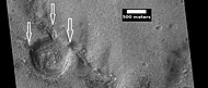 Crater with channels, as seen by HiRISE under HiWish program. Arrows show channels that carried water into and out of crater.