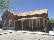 The C.D. Henry House was built in 1889 and is located in 144 (once 1520) S. Willow St. The Henry house is considered one the earliest fired brick residences remaining In Florence. Listed in the National Register of National Places on August 1, 1986, reference #86002628.