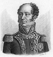 Black-and-white print of a man with a cleft chin and curly hair except for the large bald spot on top. He wears a dark uniform with a high collar, epaulettes, and a lot of braid.