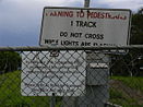 Sign of the then times (1993) at the abandoned Meeandah railway station in 2007