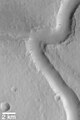 水手9号拍摄的斯卡曼德洛斯谷的曲流，这表示曾有大量水流在火星表面。
