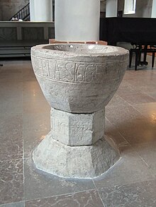 Baptismal font made out of lime stone