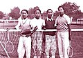 Bảo Đại (right) at the tennis court and his cousin Vĩnh Cẩn (left).