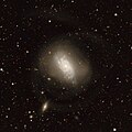The galaxy as imaged by the Legacy surveys, showing the tidal structures of NGC 1084