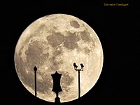 The 14 November 2016 supermoon and the Sikh religion's iconic symbol Khanda of Fateh Burj visible in its centre