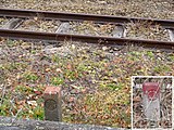非电气化路段打下的名古屋铁道、爱知电气铁道（日语：愛知電気鉄道）边界杭