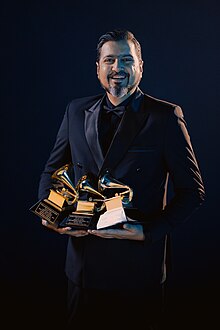 Ricky Kej with his three Grammy Awards