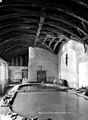 The basin for washing clothes under one of the churchyard galleries.