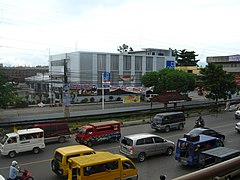 Development Bank of the Philippines and street scenario along J. C. Aquino Avenue Cor. J. Rosales Ave