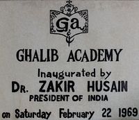 An inscription done in front of the Ghalib Academy building