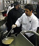 Albisu prepares risotto in 2010