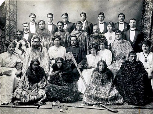 Photograph of a group of seated Maoris.