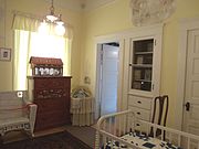 Children’s room in the Manistee Mansion .