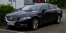 Picture of a black Jaguar XJ in a dark environment