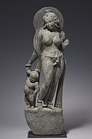 Mother Goddess from entrance of a Hindu Temple, Tanesara-Mahadeva (near Udaipur), suggesting connections with the Art of Gandhara.[72] 5th-6th[73][74] or early 7th century CE.[75]