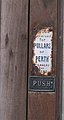 This plate, on the door of the Morris & Son's General Cambrian Establishment Drapers in High Street, Barmouth, Wales, reads 'Goods received for Pullars of Perth cleaners and dyers'