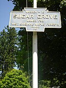 A Keystone Marker affixed to a flagpole