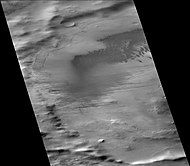 Biachini Crater, as seen by CTX camera (on Mars Reconnaissance Orbiter). Dust devil tracks and dunes are visible on the floor. The narrow, dark lines are dust devil tracks.