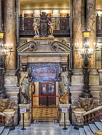 The Amphitheater Entrance. The two caryatids by Jules Thomas. Tragedy with her sword (left) and Comedy with her harp (right).